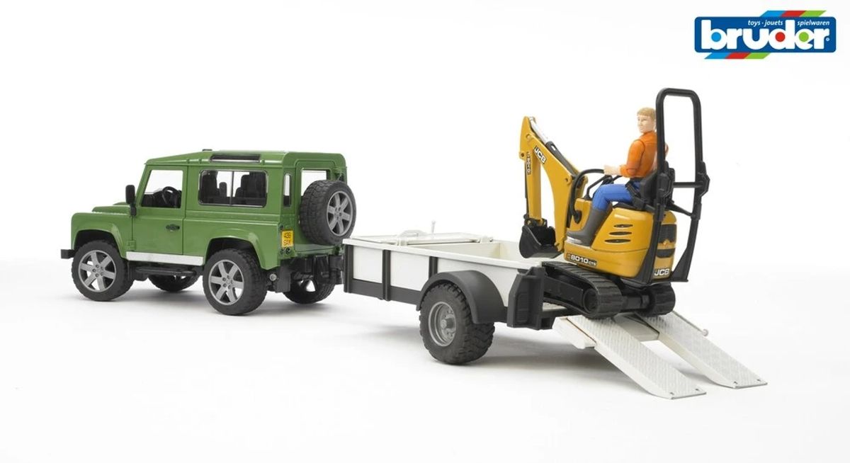 Land Rover med trailer og JCB micro gravemaskine